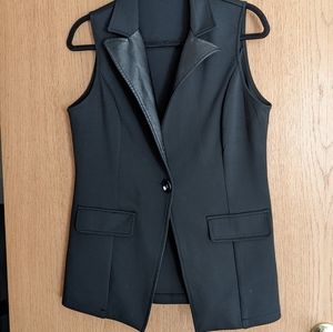 Black sleeveless blazer